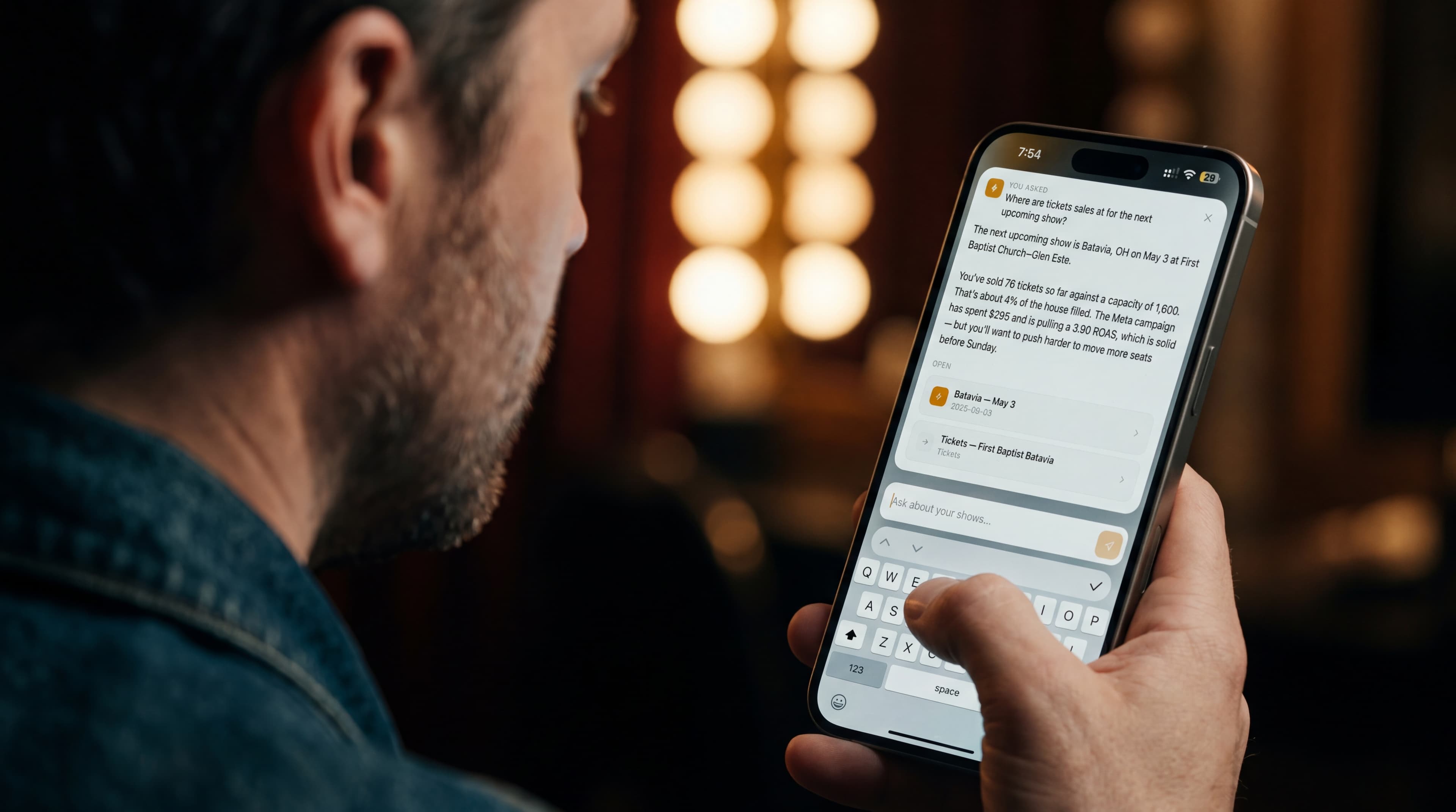 Touring artist using Ask AI on their iPhone backstage